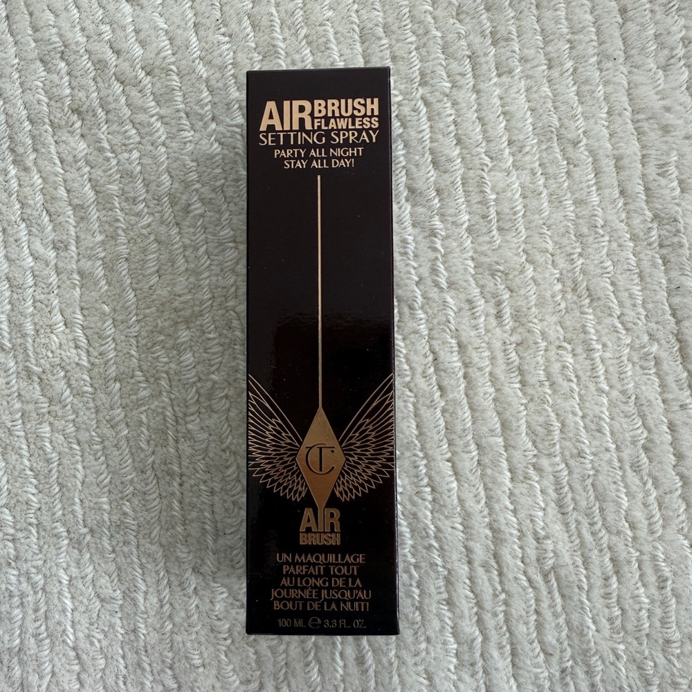 Charlotte Tilbury Airbrush Flawless Setting Spray in Black and Gold